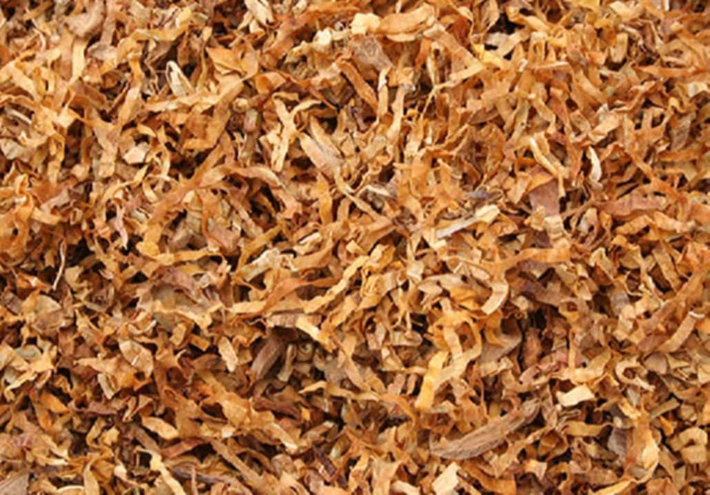 Close-up view of tobacco stems undergoing microwave expansion